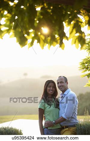 Picture - Couple posing for camera. Fotosearch