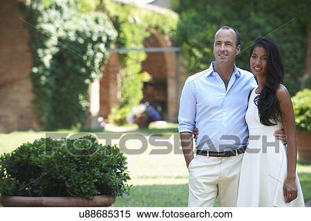 Stock Photography - Couple posing for camera. Fotosearch
