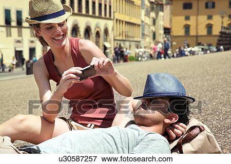 Couple relaxing, Palazzo Pitti, Florence, Tuscany, Italy View Large Photo Image Stock Photo - Couple relaxing, Palazzo Pitti, Florence, Tuscany, Italy. Fotosearch