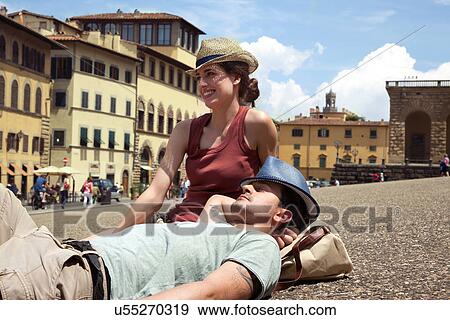 Couple relaxing, Palazzo Pitti, Florence, Tuscany, Italy View Large Photo Image Stock Photo - Couple relaxing, Palazzo Pitti, Florence, Tuscany, Italy. Fotosearch