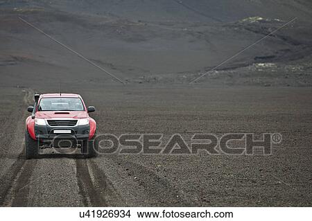 Customised SUV on gravel track, Fjallabak, Iceland View Large Photo Image Picture - Customised SUV on gravel track, Fjallabak, Iceland. Fotosearch