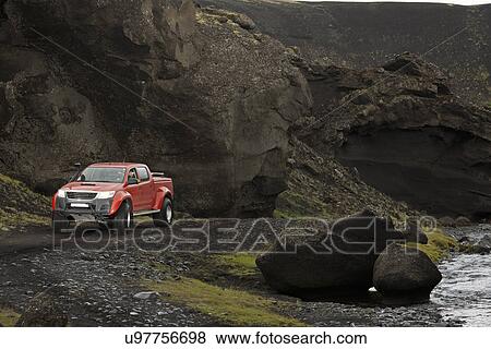Customised SUV on remote track in he Icelandic highlands, Hungurfit, Fjallabak, Iceland View Large Photo Image Stock Photo - Customised SUV on remote track in he Icelandic highlands, Hungurfit, Fjallabak, Iceland. Fotosearch