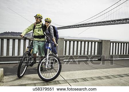 Stock Image - Cyclists on Bay Bridge, San Francisco. Fotosearch