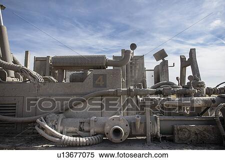 Detail of drilling rig engine against blue sky View Large Photo Image Stock Photography - Detail of drilling rig engine against blue sky. Fotosearch
