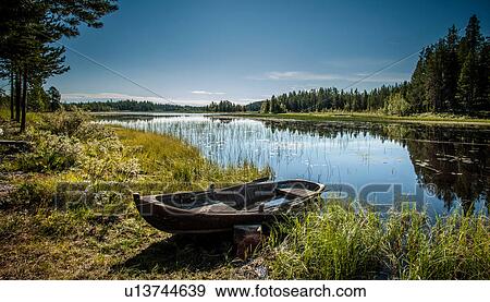 Empty row boat, Lapland, Sweden View Large Photo Image Stock Photo - Empty row boat, Lapland, Sweden. Fotosearch