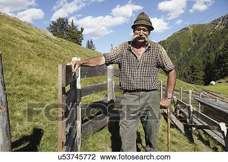 Farmer posing for camera View Large Photo Image Stock Image - Farmer posing for camera. Fotosearch