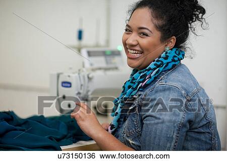 Stock Photograph - Fashion design student in class. Fotosearch