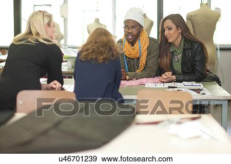 Stock Photo - Fashion design students in class. Fotosearch