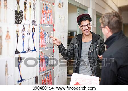 Fashion design teacher and student in discussion View Large Photo Image Picture - Fashion design teacher and student in discussion. Fotosearch