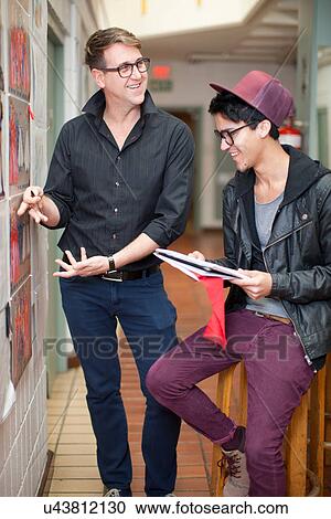 Fashion design teacher and student in discussion View Large Photo Image Stock Image - Fashion design teacher and student in discussion. Fotosearch