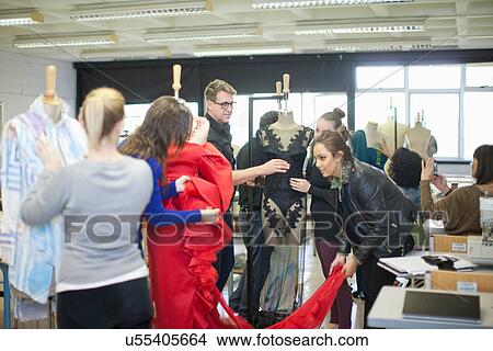 Picture - Fashion design teacher and students in class. Fotosearch