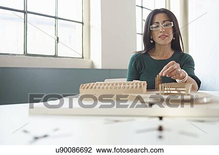 Female architect with model View Large Photo Image Stock Image - Female architect with model. Fotosearch