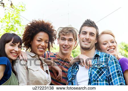 Five young friends, looking at camera View Large Photo Image Stock Photo - Five young friends, looking at camera. Fotosearch