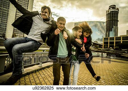 Four friends having fun in urban scnee, Russia View Large Photo Image Stock Photography - Four friends having fun in urban scnee, Russia. Fotosearch