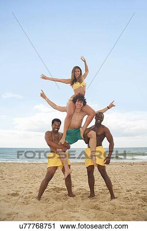 Friends having fun on beach View Large Photo Image Stock Image - Friends having fun on beach. Fotosearch