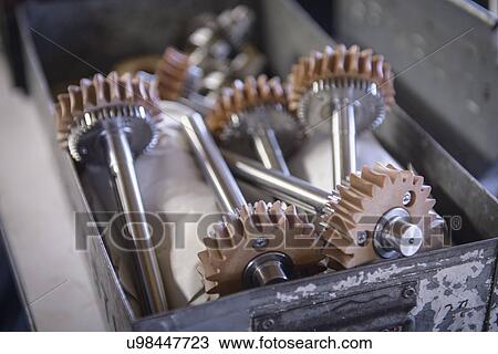 Stock Image - Group of engineered steel parts in factory. Fotosearch