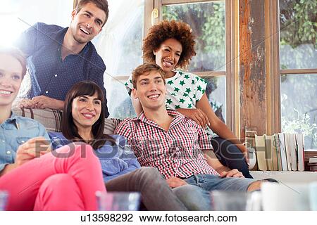Stock Image - Group of friends smiling. Fotosearch
