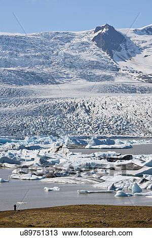 Icebergs floating in Fjallsarlon lagoon, Skaftafell, Iceland View Large Photo Image Stock Image - Icebergs floating in Fjallsarlon lagoon, Skaftafell, Iceland. Fotosearch