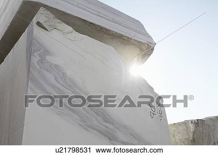 Stock Image - Large block of marble from quarry. Fotosearch