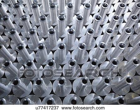 Large group of engineered parts in factory, full frame View Large Photo Image Stock Photo - Large group of engineered parts in factory, full frame. Fotosearch