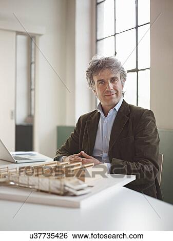 Male architect with model View Large Photo Image Stock Photograph - Male architect with model. Fotosearch