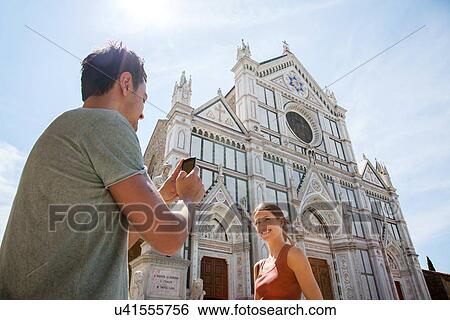 Man and woman outside Church of Santa Croce, Piazza di Santa Croce, Florence, Tuscany, Italy View Large Photo Image Stock Photograph - Man and woman outside Church of Santa Croce, Piazza di Santa Croce, Florence, Tuscany, Italy. Fotosearch