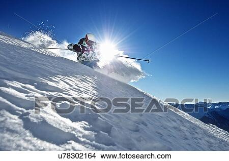 Man skiing, Verbier, Switzerland View Large Photo Image Picture - Man skiing, Verbier, Switzerland. Fotosearch
