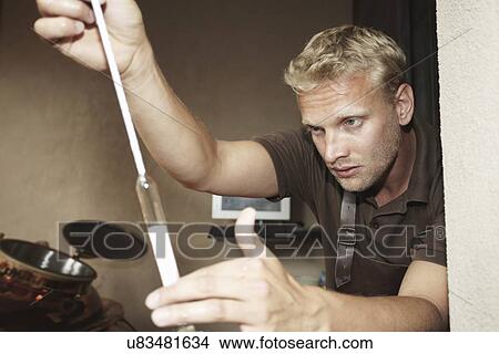 Picture - Man working at brewery. Fotosearch