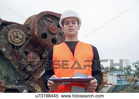 Manual worker wearing high vis vest and hard hat View Large Photo Image Stock Photography - Manual worker wearing high vis vest and hard hat. Fotosearch