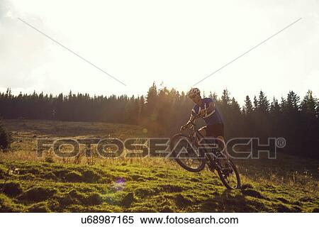 Mature man mountain biking, Styria, Austria View Large Photo Image Stock Photography - Mature man mountain biking, Styria, Austria. Fotosearch