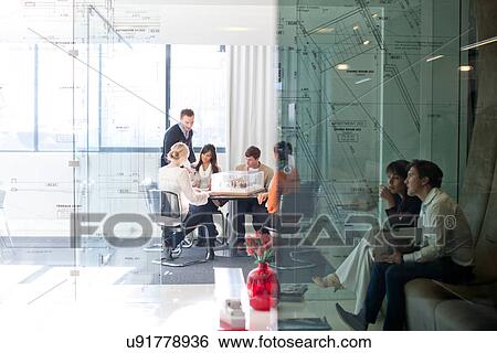 Stock Photograph - Meetings in architects office. Fotosearch