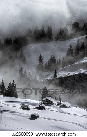 Stock Photo - Misty scene, Murren, Bernese Oberland, Switzerland. Fotosearch