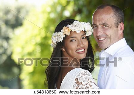 Newlyweds in embrace View Large Photo Image Stock Image - Newlyweds in embrace. Fotosearch