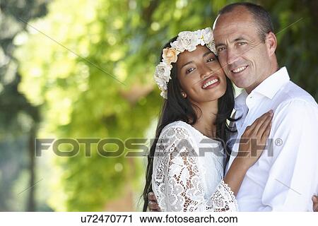 Newlyweds in embrace View Large Photo Image Stock Image - Newlyweds in embrace. Fotosearch