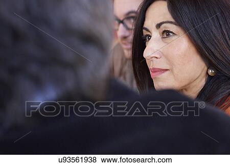 Stock Photo - Office colleagues in meeting. Fotosearch