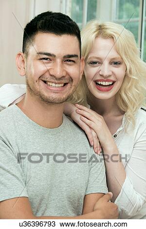 Portrait of a happy couple View Large Photo Image Stock Image - Portrait of a happy couple. Fotosearch