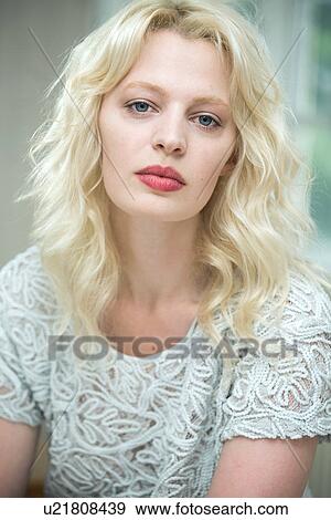 Stock Photo - Portrait of a young blonde woman. Fotosearch