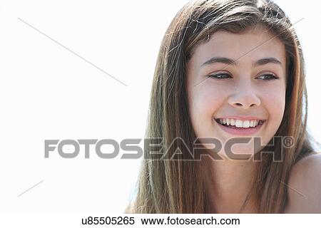 Portrait of brunette teenage girl looking away, smiling View Large Photo Image Stock Photography - Portrait of brunette teenage girl looking away, smiling. Fotosearch