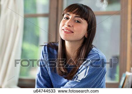 Portrait of brunette woman smiling View Large Photo Image Stock Image - Portrait of brunette woman smiling. Fotosearch