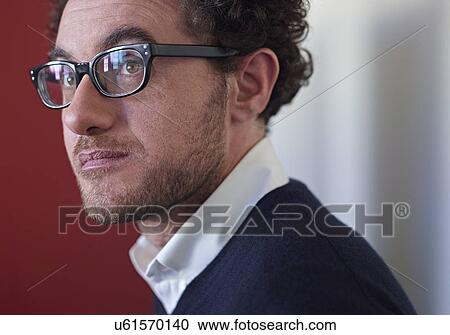 Portrait of businessman wearing glasses View Large Photo Image Stock Image - Portrait of businessman wearing glasses. Fotosearch