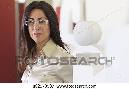 Portrait of businesswoman wearing glasses View Large Photo Image Stock Photo - Portrait of businesswoman wearing glasses. Fotosearch