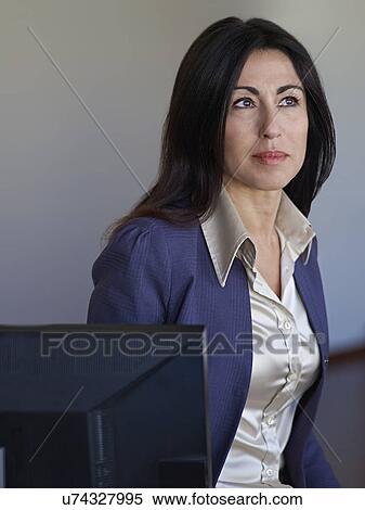 Portrait of businesswoman wearing jacket and blouse View Large Photo Image Stock Photography - Portrait of businesswoman wearing jacket and blouse. Fotosearch