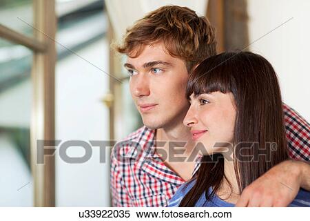 Portrait of couple looking away View Large Photo Image Stock Photography - Portrait of couple looking away. Fotosearch