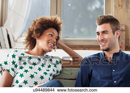 Portrait of couple relaxing View Large Photo Image Picture - Portrait of couple relaxing. Fotosearch