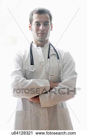 Portrait of doctor with arms folded View Large Photo Image Stock Image - Portrait of doctor with arms folded. Fotosearch