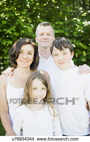 Portrait of family with two children View Large Photo Image Picture - Portrait of family with two children. Fotosearch