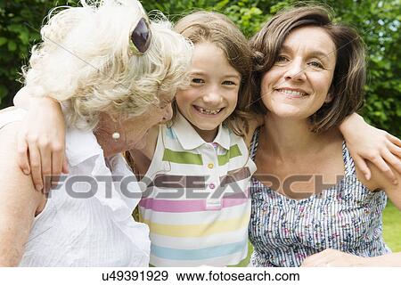 Portrait of grandmother, granddaughter and adult daughter View Large Photo Image Stock Photo - Portrait of grandmother, granddaughter and adult daughter. Fotosearch