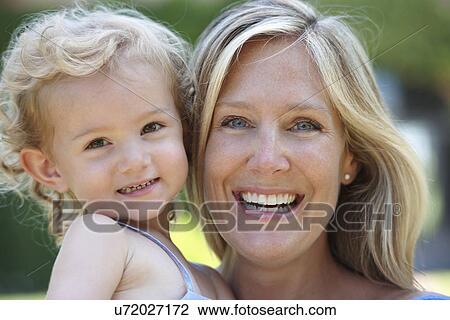 Portrait of happy mother and daughter View Large Photo Image Stock Image - Portrait of happy mother and daughter. Fotosearch