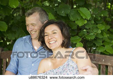 Portrait of mature couple laughing View Large Photo Image Picture - Portrait of mature couple laughing. Fotosearch