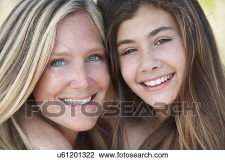 Portrait of mother and daughter View Large Photo Image Stock Image - Portrait of mother and daughter. Fotosearch